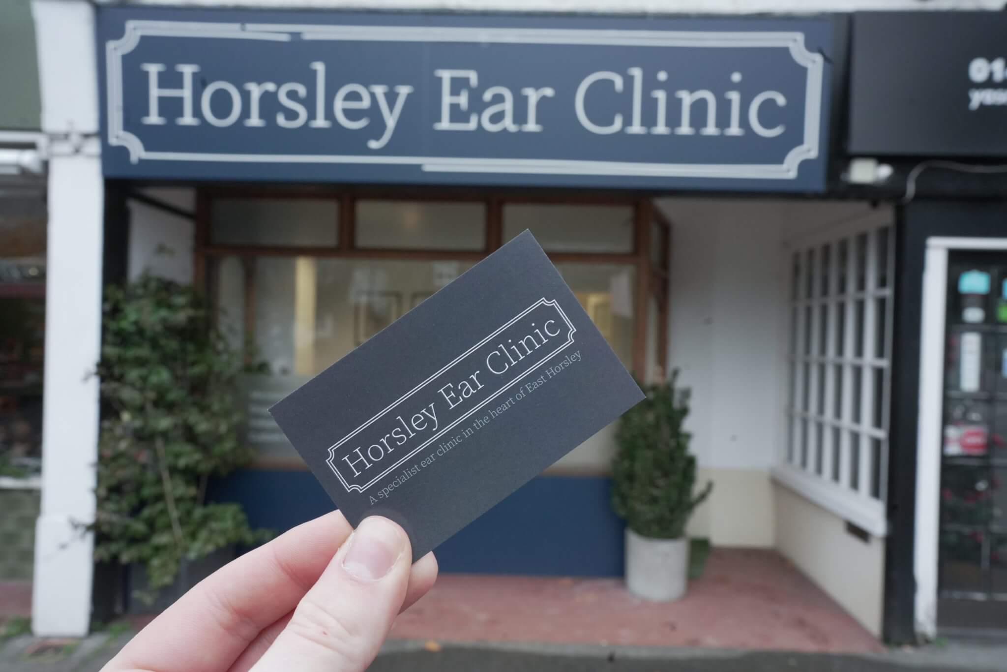 horsley ear clinic business card outside store